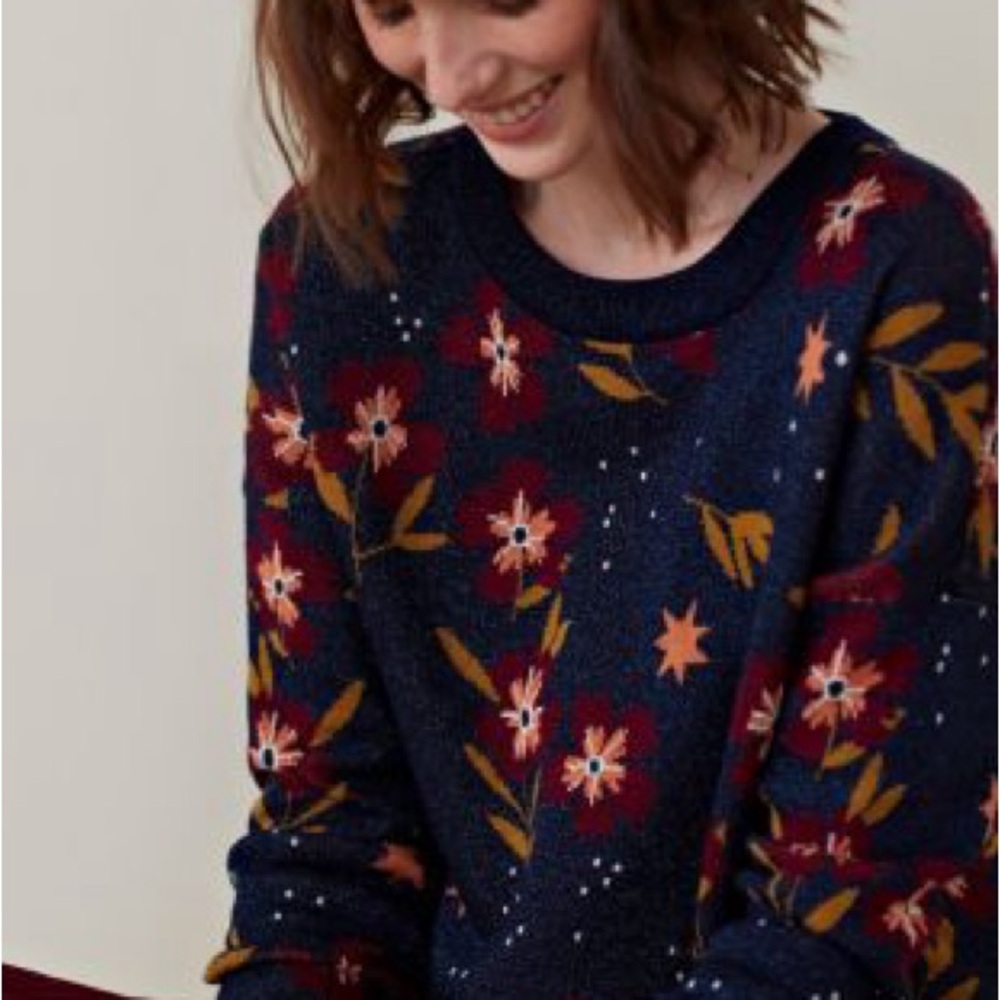 Vibrant Blue and Red Crew Neck Sweater with Botanical Design